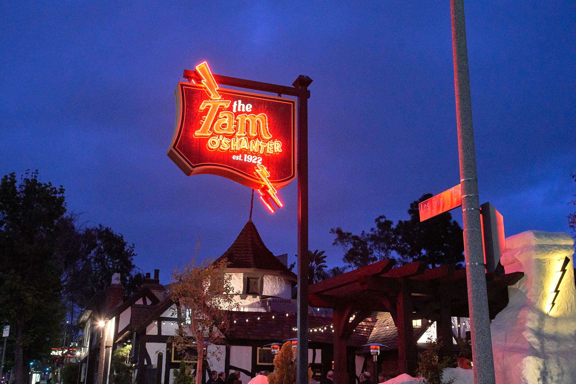 Neon sign of a lightning bolt illuminated at night